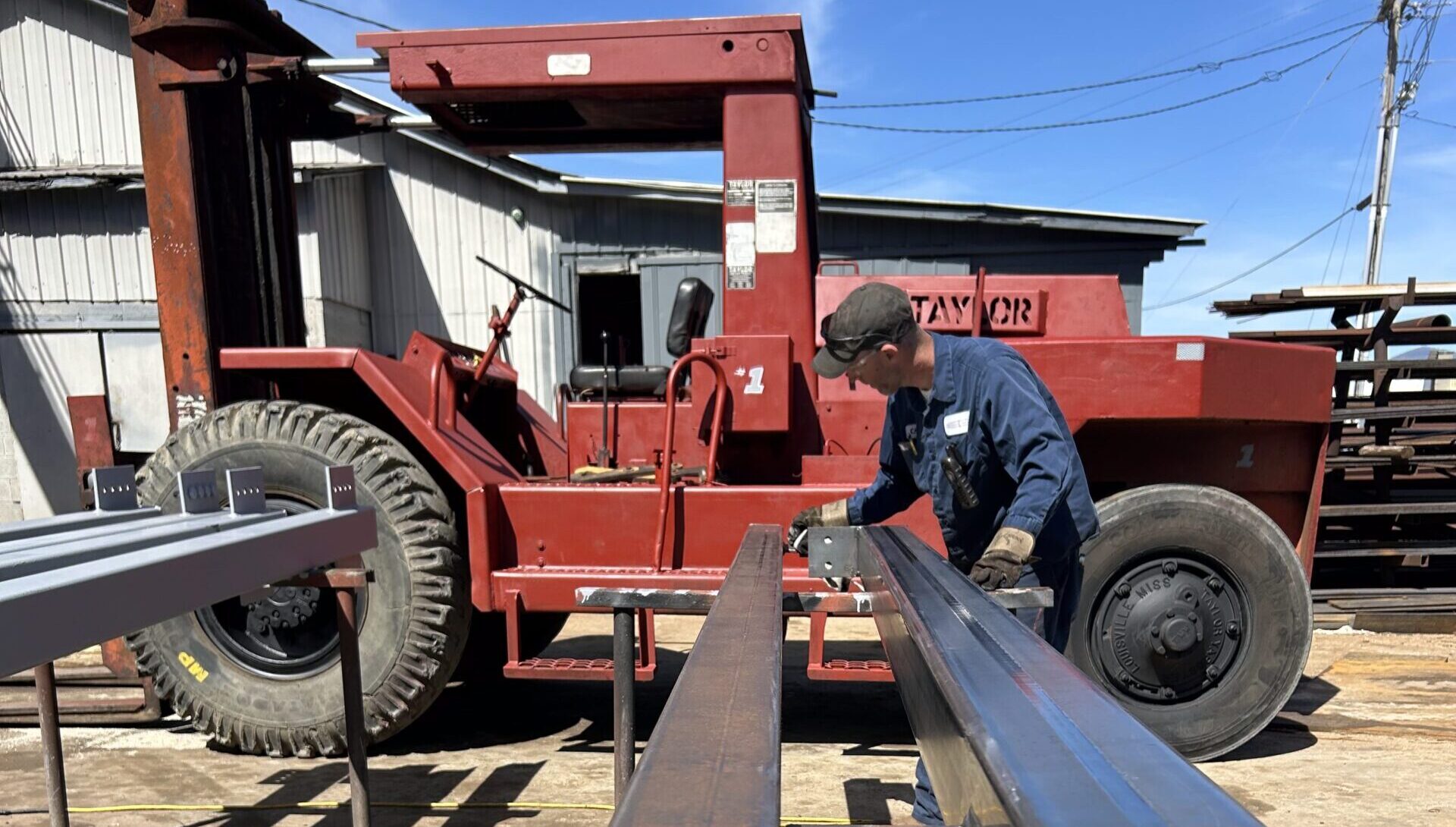 Franklin Machine Co. team member operating heavy equipment at the Franklin, NC facility full service steel fabrication and truck shop since 1940